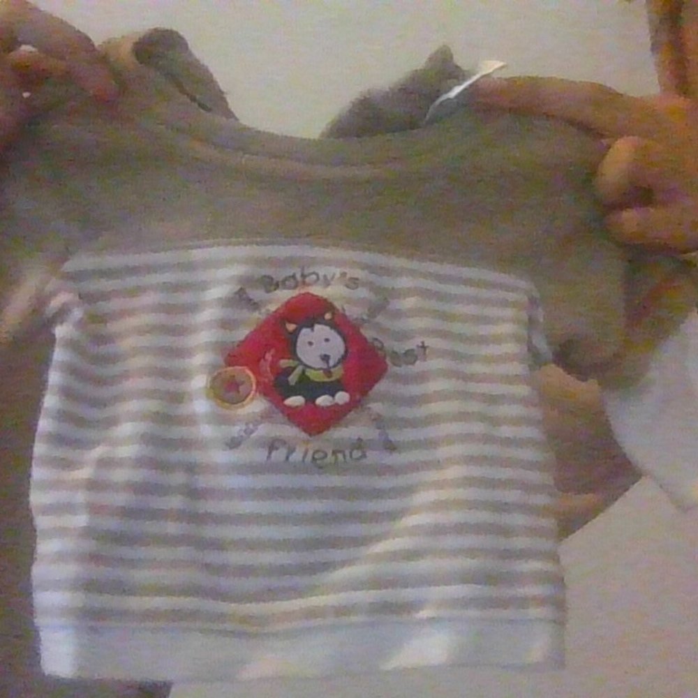 A "Baby's best friend" newborn cozy shirt.